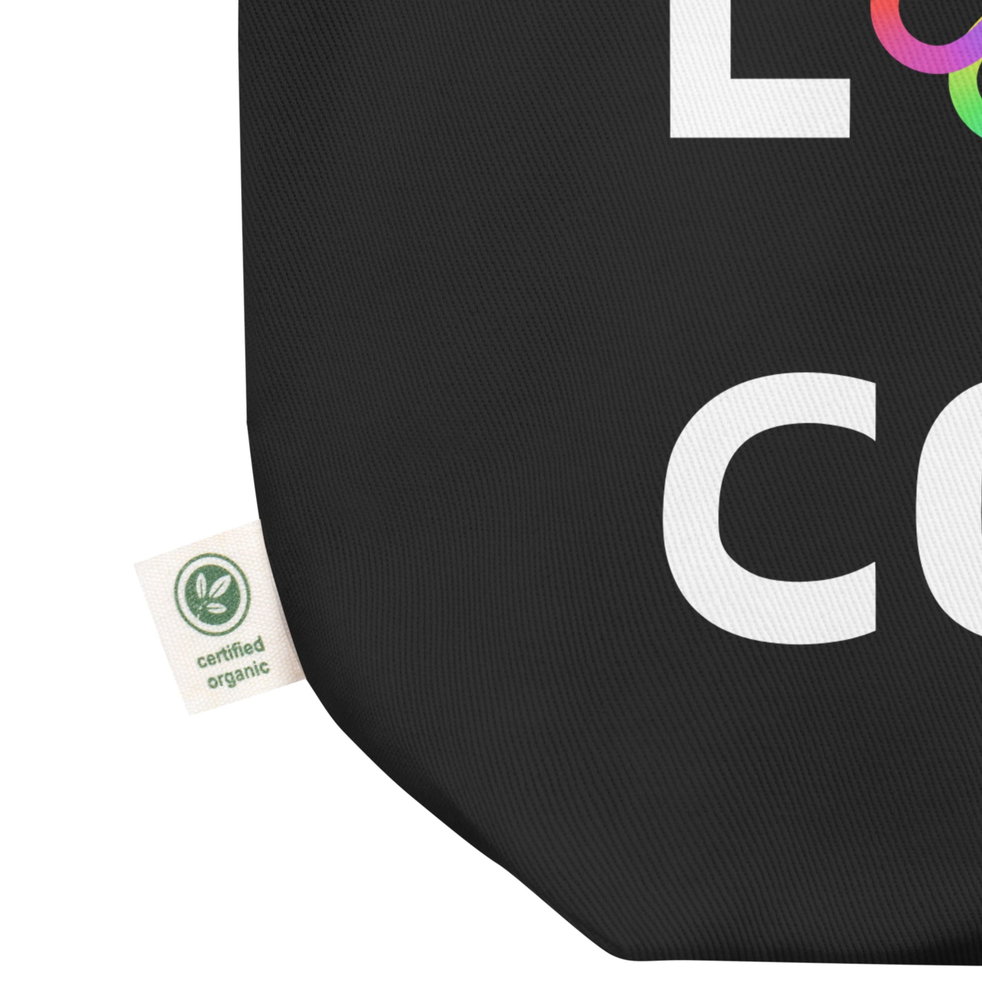 Black canvas tote bag with white bold print that says LIVE LOVE COLOR. The letter O in the word LOVE has been replaced with rainbow infinity symbols.
