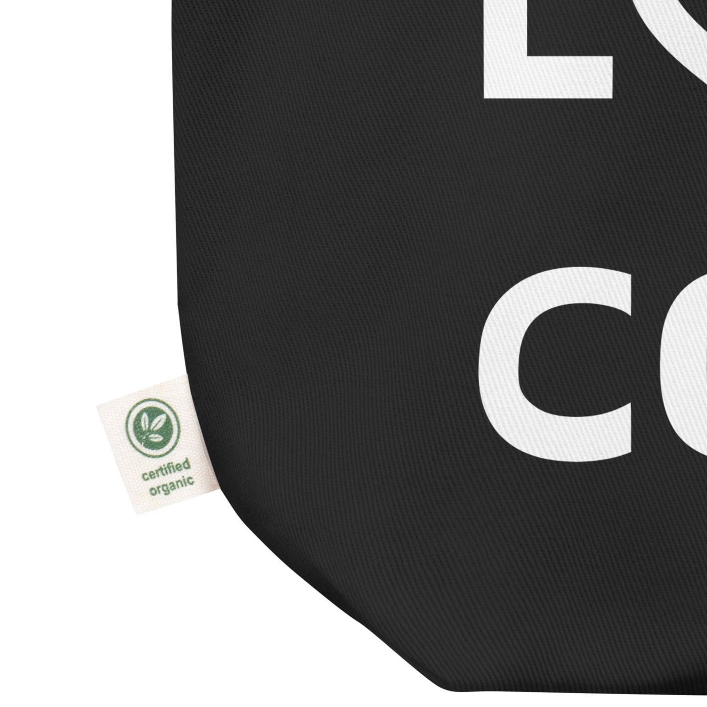 Black canvas tote bag with white bold print that says LIVE LOVE COLOR. The letter O in the word LOVE has been replaced with a heart symbol.