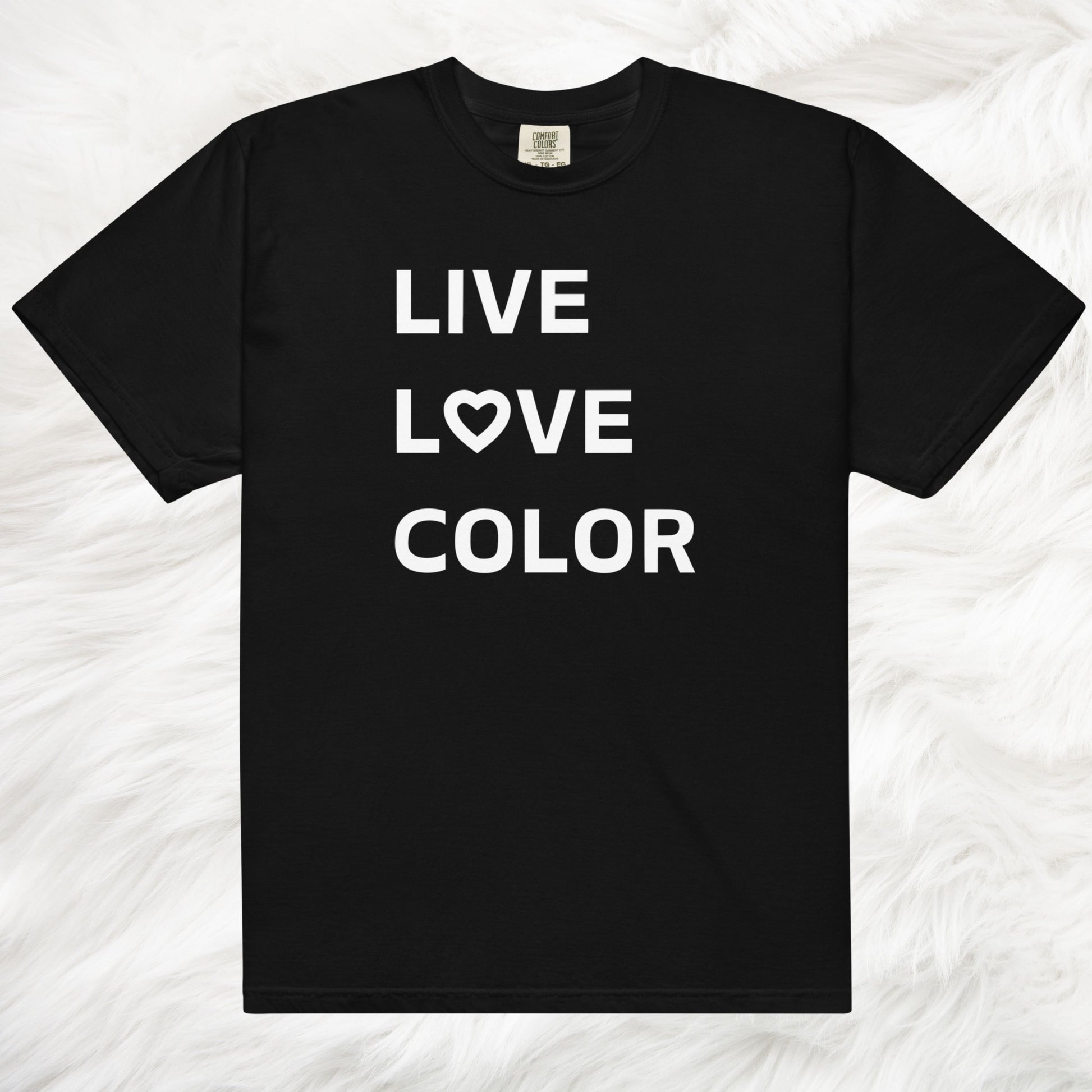 Black color T-Shirt with white bold print that says LIVE LOVE COLOR. The letter O in the word LOVE has been replaced with a heart symbol.