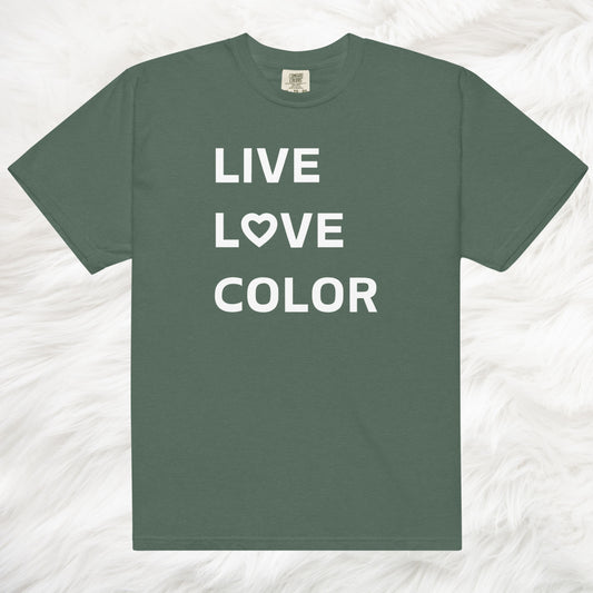 Blue Spruce color T-Shirt with white bold print that says LIVE LOVE COLOR. The letter O in the word LOVE has been replaced with a heart symbol.