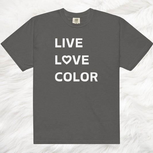 Pepper color T-Shirt with white bold print that says LIVE LOVE COLOR. The letter O in the word LOVE has been replaced with a heart symbol.