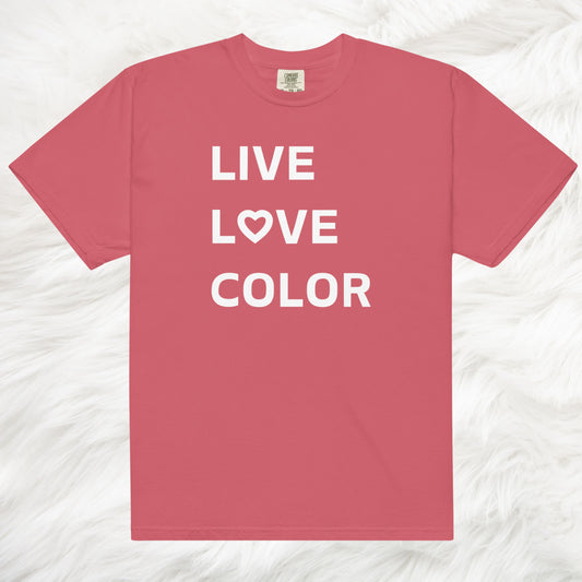 Watermelon color T-Shirt with white bold print that says LIVE LOVE COLOR. The letter O in the word LOVE has been replaced with a heart symbol.