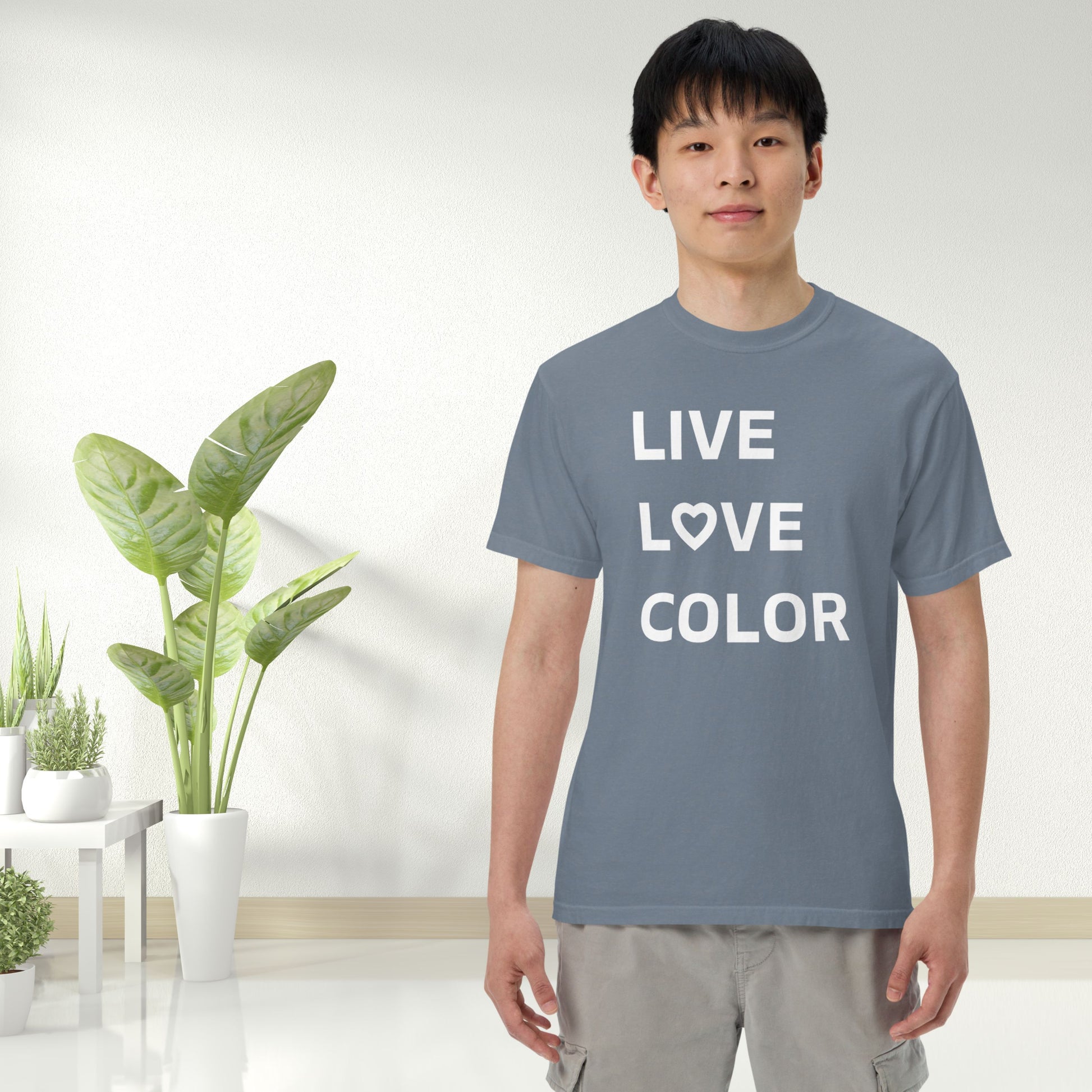 Blue Jean color T-Shirt with white bold print that says LIVE LOVE COLOR. The letter O in the word LOVE has been replaced with a heart symbol.