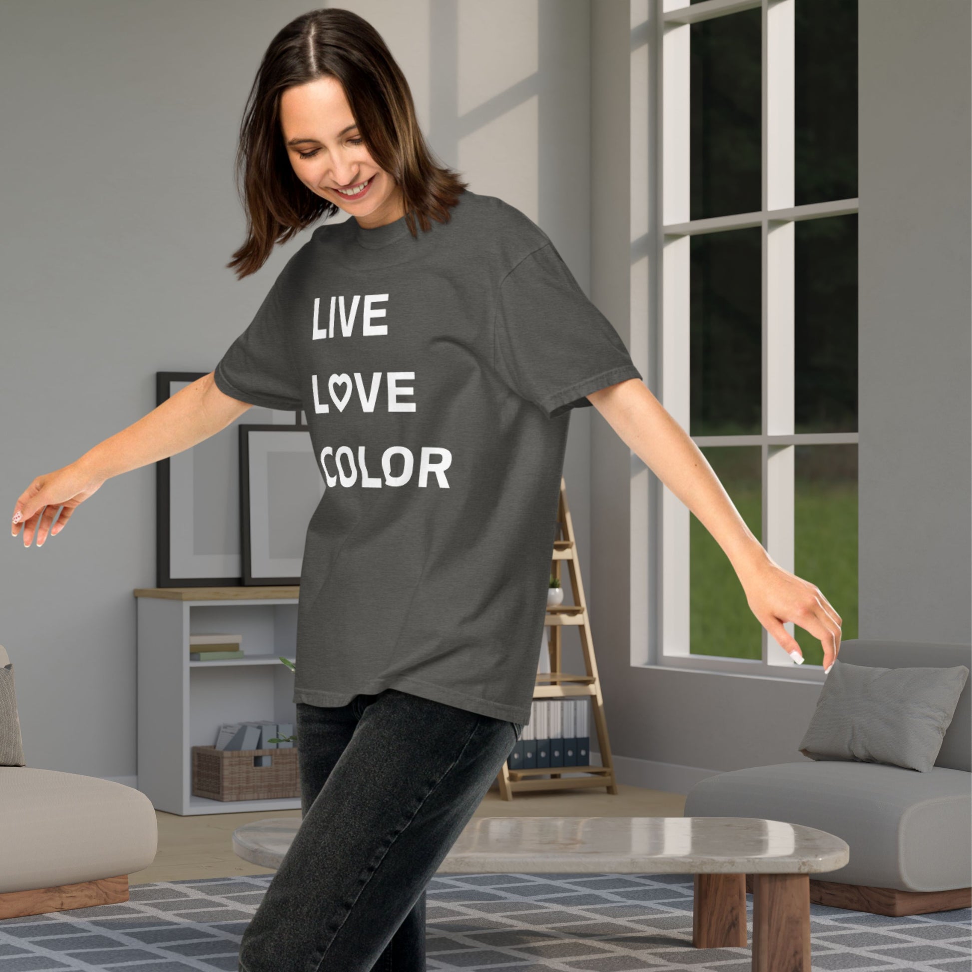 Pepper color T-Shirt with white bold print that says LIVE LOVE COLOR. The letter O in the word LOVE has been replaced with a heart symbol.